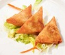 709. Samosa al curry* 3pz