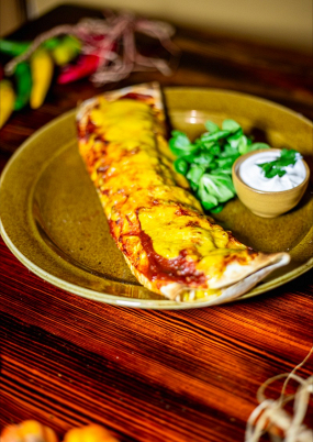 180g ENCHILADA CON CERDO Y FRIJOLES