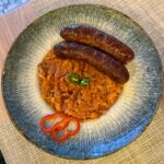 Varză călită cu cârnați la cuptor