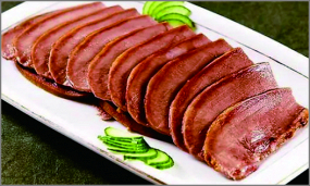 B07 Limbă  de porc in sos soia