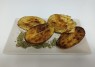 Patatas asadas eco.al horno con un toque de pimienta.