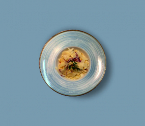 Tagliatelle con prosciutto e rucola