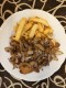 Schnitzel mit gebratenen Zwiebeln