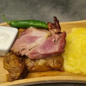 Sarmale cu Carne, Mămăliguță, Ciolan, Smântână, Ardei Iute/ Cabbage Rolls with Smoked Pork Knuckle