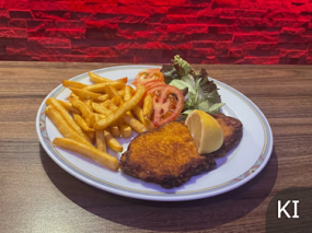 Schweineschnitzel mit Pommes