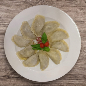 Pierogi z gęsiną, truflą i pieczarkami, sos grzybowy (8szt.)