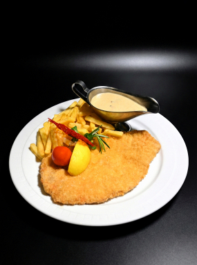 Putenschnitzel  in Knusper Panade