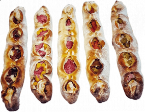 Caliente Stick mit Mozzarella, getrocknete Tomaten und Basilikum